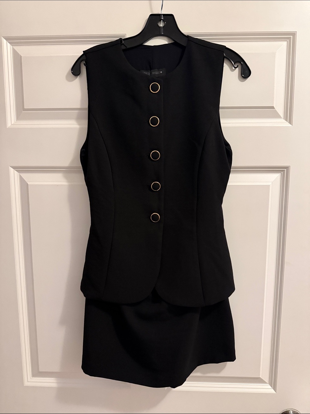 Classic Black Sleeveless Romper Dress with Gold Buttons
